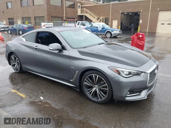 ✅ 2018 Infiniti Q60 Luxe • VIN: JN1EV7EL7JM391597 • Лот: 43703404. Опубликован ранее на IAAI с пробегом 49 485 миль. Бесплатный доступ к архиву аукционных продаж из США и подробный отчёт об истории автомобиля на DreamBid. Изображение 1.