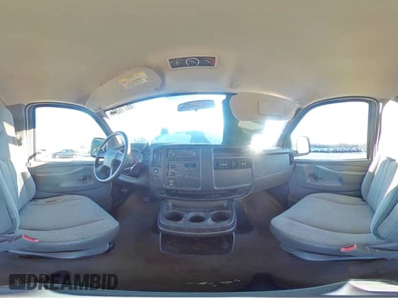 2005 Chevrolet Express Passenger с VIN 1GAGG25V051202535, выставлен на аукционе Copart как лот 86716874 с пробегом 202 331 миль миль и Списание • Salvage title. История ставок и продаж доступна на DreamBid. Изображение 14.