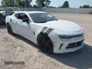 2016 Chevrolet Camaro 1LT z VIN 1G1FA1RX2G0161224, wystawiony jako IAAI lot #42247966 z przebiegiem 98 599 mil mil oraz . Historia ofert i sprzedaży dostępna na DreamBid. Obrazek 1.