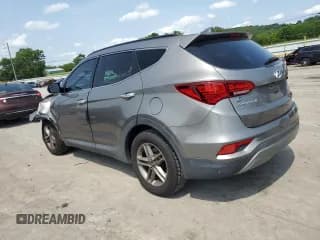 ✅ 2017 Hyundai Santa Fe 2.4L • VIN: 5XYZUDLB2HG384028 • Лот: 57948904. Опубликован ранее на Copart с пробегом 89 134 миль. Бесплатный доступ к архиву аукционных продаж из США и подробный отчёт об истории автомобиля на DreamBid. Изображение 2.