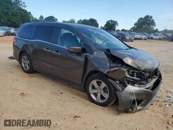 ✅ 2020 Honda Odyssey EX • VIN: 5FNRL6H5XLB012518 • Lot: 56355435. Listed on Copart with 67,197 mi. Free auction sales archive from the USA and detailed vehicle history report at DreamBid. Image 4.