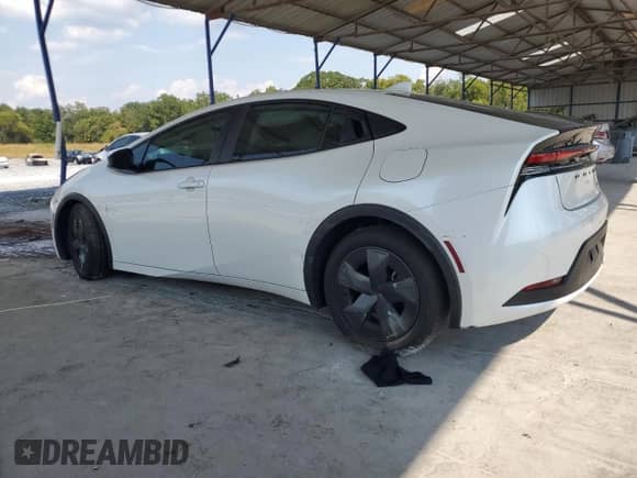 2025 Toyota Prius LE с VIN JTDACAAU5S3052468, выставлен на аукционе Copart как лот 81701345 с пробегом Не указан миль и Списание • Salvage title. История ставок и продаж доступна на DreamBid. Изображение 2.