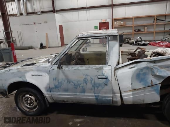 ✅ 1982 Datsun 720 • VIN: JN6MD01S7CW103064 • Lot: 41831434. Wystawiony na IAAI z przebiegiem 175 954 mil. Bezpłatny archiwum sprzedaży aukcyjnych z USA i szczegółowy raport historii pojazdu na DreamBid. Zdjęcie 13.