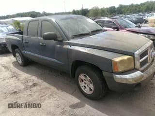 ✅ 2005 Dodge Dakota SLT • VIN: 1D7HW48K15S163935 • Lot: 43167895. Wystawiony na IAAI z przebiegiem 149 958 mil. Bezpłatny archiwum sprzedaży aukcyjnych z USA i szczegółowy raport historii pojazdu na DreamBid. Zdjęcie 1.