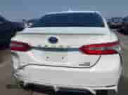 2020 Toyota Camry Hybrid SE z VIN 4T1G31AK0LU541702, wystawiony jako IAAI lot #42918554 z przebiegiem 118 679 mil mil oraz . Historia ofert i sprzedaży dostępna na DreamBid. Obrazek 16.