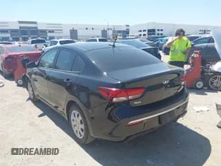 ✅ 2023 Kia Rio S • VIN: 3KPA24AD7PE564852 • Lot: 43141187. Listed on IAAI with 127,507 mi. Free auction sales archive from the USA and detailed vehicle history report at DreamBid. Image 3.