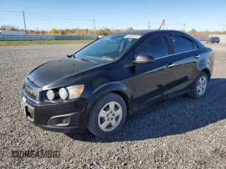 2012 Chevrolet Sonic LT z VIN 1G1JC5EHXC4204379, wystawiony jako Copart lot #90040615 z przebiegiem 186 920 mil mil oraz Szkoda całkowita • Salvage title. Historia ofert i sprzedaży dostępna na DreamBid. Obrazek 1.
