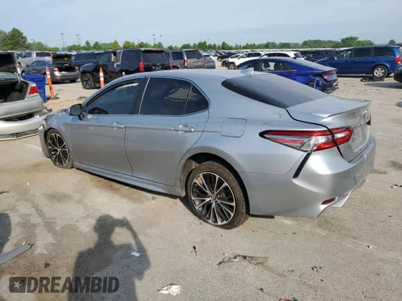 2019 Toyota Camry LE z VIN 4T1B11HK6KU210594, wystawiony jako Copart lot #66894775 z przebiegiem Nie podano mil oraz Szkoda całkowita • Salvage title. Historia ofert i sprzedaży dostępna na DreamBid. Obrazek 2.