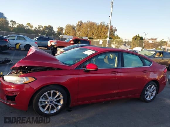 ✅ 2020 Ford Fusion SE • VIN: 3FA6P0LU9LR229520 • Lot: 43575006. Listed on IAAI with 54,509 mi. Free auction sales archive from the USA and detailed vehicle history report at DreamBid. Image 14.