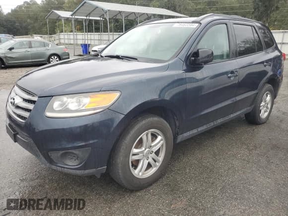 ✅ 2012 Hyundai Santa Fe GLS • VIN: 5XYZG3AB7CG124818 • Lot: 79463594. Listed on Copart with 186,656 mi. Free auction sales archive from the USA and detailed vehicle history report at DreamBid. Image 1.