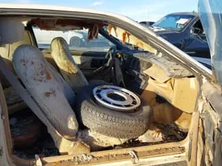 ✅ 1984 Pontiac Firebird • VIN: 1G2AS8719EL262458 • Lot: 43611020. Listed on IAAI with 104,068 mi. Free auction sales archive from the USA and detailed vehicle history report at DreamBid. Image 5.