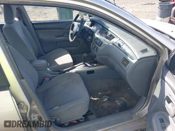 ✅ 2005 Mitsubishi Lancer ES • VIN: JA3AJ26E55U014748 • Lot: 41935566. Listed on IAAI with 255,336 mi. Free auction sales archive from the USA and detailed vehicle history report at DreamBid. Image 5.