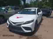 2022 Toyota Camry SE with VIN 4T1G11BKXNU067748, listed as a IAAI auction lot 42637849 with 73,909 mi miles and . Bid and sale history available at DreamBid. Image 2.