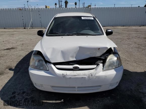 ✅ 2005 Kia Rio • VIN: KNADC125056401606 • Lot: 75290524. Listed on Copart with 59,252 mi. Free auction sales archive from the USA and detailed vehicle history report at DreamBid. Image 5.