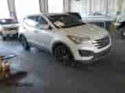 2015 Hyundai Santa Fe z VIN 5XYZTDLB4FG294735, wystawiony jako IAAI lot #43230960 z przebiegiem 169 342 mil mil oraz . Historia ofert i sprzedaży dostępna na DreamBid. Obrazek 1.