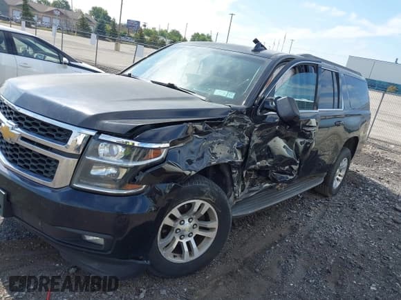 ✅ 2015 Chevrolet Suburban LT • VIN: 1GNSKJKC5FR688637 • Lot: 43232837. Listed on IAAI with 267,129 mi. Free auction sales archive from the USA and detailed vehicle history report at DreamBid. Image 2.