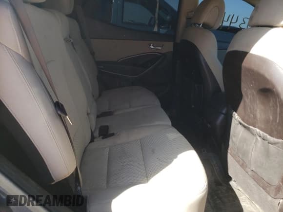 ✅ 2017 Hyundai Santa Fe 2.4L • VIN: 5NMZT3LB9HH042112 • Лот: 63152892. Опубликован ранее на Copart с пробегом 103 444 миль. Бесплатный доступ к архиву аукционных продаж из США и подробный отчёт об истории автомобиля на DreamBid. Изображение 6.