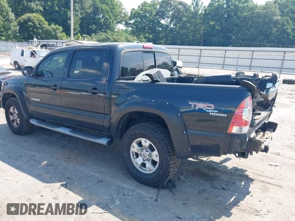 ✅ 2010 Toyota Tacoma PreRunner • VIN: 3TMJU4GN8AM101948 • Lot: 42655977. Listed on IAAI with 228,965 mi. Free auction sales archive from the USA and detailed vehicle history report at DreamBid. Image 3.