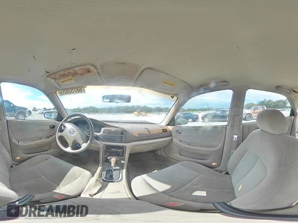 ✅ 2002 Mazda 626 LX • VIN: 1YVGF22C625301436 • Lot: 68753555. Listed on Copart with 147,202 mi. Free auction sales archive from the USA and detailed vehicle history report at DreamBid. Image 15.