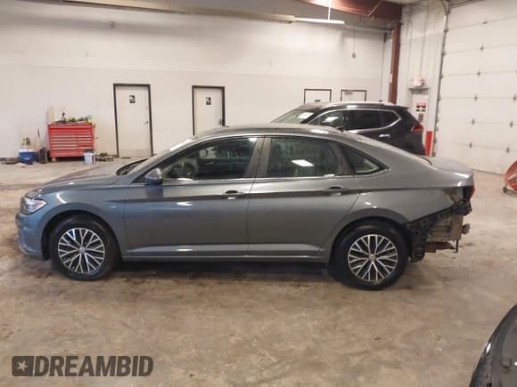 ✅ 2021 Volkswagen Jetta S • VIN: 3VWN57BU7MM102699 • Лот: 43376432. Опубликован ранее на IAAI с пробегом 23 175 миль. Бесплатный доступ к архиву аукционных продаж из США и подробный отчёт об истории автомобиля на DreamBid. Изображение 14.
