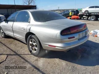 ✅ 1996 Oldsmobile Aurora • VIN: 1G3GR62C8T4115201 • Lot: 41833178. Wystawiony na IAAI z przebiegiem 159 049 mil. Bezpłatny archiwum sprzedaży aukcyjnych z USA i szczegółowy raport historii pojazdu na DreamBid. Zdjęcie 3.