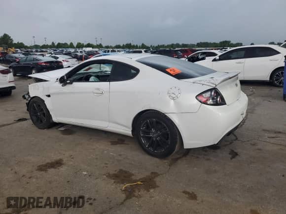2008 Hyundai Tiburon GS с VIN KMHHM66DX8U278537, выставлен на аукционе Copart как лот 62597005 с пробегом Не указан миль и Списание • Salvage title. История ставок и продаж доступна на DreamBid. Изображение 2.