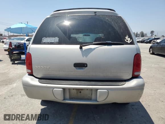 ✅ 1999 Dodge Durango • VIN: 1B4HR28Y2XF618309 • Lot: 60302875. Wystawiony na Copart z przebiegiem 175 030 mil. Bezpłatny archiwum sprzedaży aukcyjnych z USA i szczegółowy raport historii pojazdu na DreamBid. Zdjęcie 6.