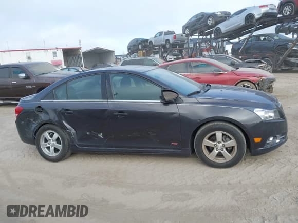 ✅ 2014 Chevrolet Cruze 1LT • VIN: 1G1PC5SB5E7140456 • Lot: 43527056. Listed on IAAI with 45,788 mi. Free auction sales archive from the USA and detailed vehicle history report at DreamBid. Image 13.