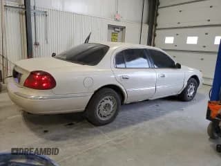 ✅ 2002 Lincoln Continental • VIN: 1LNHM97VX2Y694578 • Lot: 42245705. Wystawiony na Copart z przebiegiem 195 236 mil. Bezpłatny archiwum sprzedaży aukcyjnych z USA i szczegółowy raport historii pojazdu na DreamBid. Zdjęcie 3.