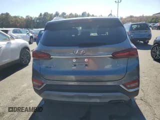 ✅ 2020 Hyundai Santa Fe SEL • VIN: 5NMS3CADXLH155159 • Lot: 73376483. Wystawiony na Copart z przebiegiem 50 856 mil. Bezpłatny archiwum sprzedaży aukcyjnych z USA i szczegółowy raport historii pojazdu na DreamBid. Zdjęcie 6.