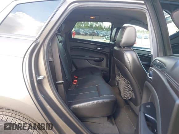 ✅ 2014 Cadillac SRX • VIN: 3GYFNAE31ES556252 • Lot: 43317021. Wystawiony na IAAI z przebiegiem 162 882 mil. Bezpłatny archiwum sprzedaży aukcyjnych z USA i szczegółowy raport historii pojazdu na DreamBid. Zdjęcie 8.