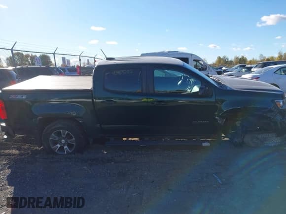 ✅ 2016 Chevrolet Colorado 4WD Z71 • VIN: 1GCGTDE33G1195466 • Лот: 43463286. Опубликован ранее на IAAI с пробегом 123 162 миль. Бесплатный доступ к архиву аукционных продаж из США и подробный отчёт об истории автомобиля на DreamBid. Изображение 14.