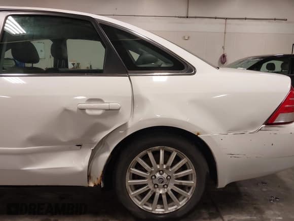 ✅ 2005 Mercury Montego Premier • VIN: 1MEFM431X5G618563 • Лот: 42773346. Опубликован ранее на IAAI с пробегом 151 425 миль. Бесплатный доступ к архиву аукционных продаж из США и подробный отчёт об истории автомобиля на DreamBid. Изображение 6.