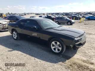 2014 Dodge Challenger SXT z VIN 2C3CDYAG4EH116448, wystawiony jako Copart lot #74385454 z przebiegiem 239 499 mil mil oraz Czysty tytuł • Clean title. Historia ofert i sprzedaży dostępna na DreamBid. Obrazek 4.