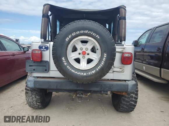 ✅ 2003 Jeep Wrangler Rubicon • VIN: 1J4FA69S53P340085 • Lot: 74564574. Listed on Copart with Not provided. Free auction sales archive from the USA and detailed vehicle history report at DreamBid. Image 6.