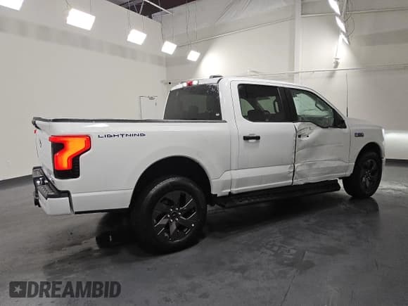 ✅ 2024 Ford F-150 Lightning XLT • VIN: 1FTVW3LKXRWG06404 • Lot: 84980215. Listed on Copart with 14,760 mi. Free auction sales archive from the USA and detailed vehicle history report at DreamBid. Image 3.