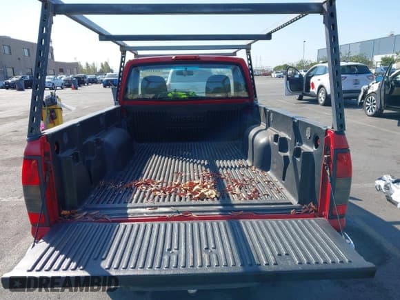 ✅ 2000 Nissan Frontier XE • VIN: 1N6DD21S5YC380834 • Lot: 43012557. Listed on IAAI with 182,489 mi. Free auction sales archive from the USA and detailed vehicle history report at DreamBid. Image 8.