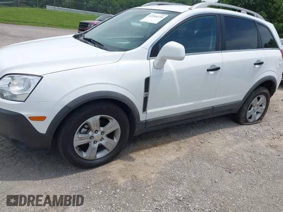 ✅ 2014 Chevrolet Captiva Sport LS • VIN: 3GNAL2EK2ES621832 • Lot: 42246539. Wystawiony na IAAI z przebiegiem 73 788 mil. Bezpłatny archiwum sprzedaży aukcyjnych z USA i szczegółowy raport historii pojazdu na DreamBid. Zdjęcie 2.