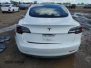 ✅ 2021 Tesla Model 3 Standard Range Plus • VIN: 5YJ3E1EA5MF045951 • Lot: 69593805. Wystawiony na Copart z przebiegiem 47 334 mil. Bezpłatny archiwum sprzedaży aukcyjnych z USA i szczegółowy raport historii pojazdu na DreamBid. Zdjęcie 6.