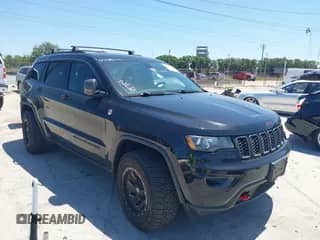 2017 Jeep Grand Cherokee Trailhawk with VIN 1C4RJFLG3HC836072, listed as a IAAI auction lot 42073775 with 139,374 mi miles and . Bid and sale history available at DreamBid. Image 1.
