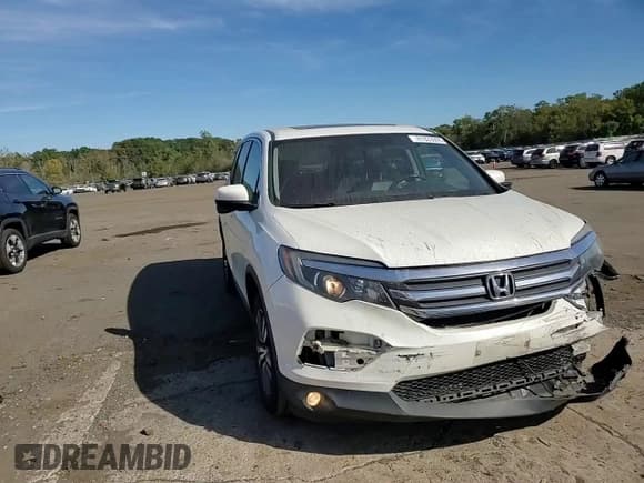 ✅ 2018 Honda Pilot EX-L • VIN: 5FNYF6H73JB063280 • Лот: 81833095. Опубликован ранее на Copart с пробегом 147 655 миль. Бесплатный доступ к архиву аукционных продаж из США и подробный отчёт об истории автомобиля на DreamBid. Изображение 14.