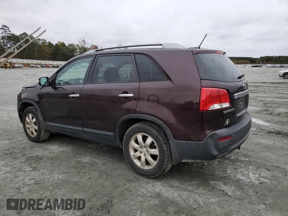 ✅ 2012 Kia Sorento LX • VIN: 5XYKT4A23CG198689 • Lot: 90108165. Listed on Copart with 324,537 mi. Free auction sales archive from the USA and detailed vehicle history report at DreamBid. Image 2.
