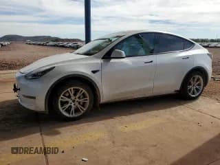 ✅ 2022 Tesla Model Y Long Range • VIN: 7SAYGDEE3NF324467 • Lot: 89684745. Wystawiony na Copart z przebiegiem 68 690 mil. Bezpłatny archiwum sprzedaży aukcyjnych z USA i szczegółowy raport historii pojazdu na DreamBid. Zdjęcie 1.