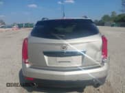 ✅ 2014 Cadillac SRX Luxury Collection • VIN: 3GYFNEE37ES638185 • Lot: 43238070. Listed on IAAI with 62,189 mi. Free auction sales archive from the USA and detailed vehicle history report at DreamBid. Image 16.