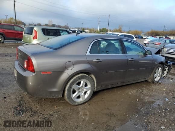 ✅ 2011 Chevrolet Malibu 1LS • VIN: 1G1ZB5E14BF303906 • Lot: 78936374. Listed on Copart with 131,916 mi. Free auction sales archive from the USA and detailed vehicle history report at DreamBid. Image 3.