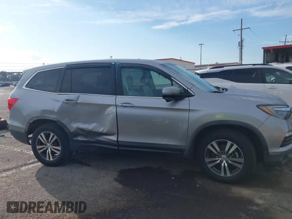 ✅ 2018 Honda Pilot EX-L • VIN: 5FNYF5H5XJB001545 • Лот: 42865283. Опубликован ранее на IAAI с пробегом 75 577 миль. Бесплатный доступ к архиву аукционных продаж из США и подробный отчёт об истории автомобиля на DreamBid. Изображение 13.