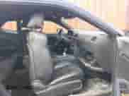 2014 Dodge Challenger SXT z VIN 2C3CDYAG0EH313973, wystawiony jako IAAI lot #43497087 z przebiegiem 136 844 mil mil oraz . Historia ofert i sprzedaży dostępna na DreamBid. Obrazek 5.