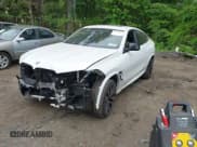 ✅ 2023 BMW X6 M • VIN: 5YMCY0C01P9R18239 • Lot: 42243183. Listed on IAAI with 23,689 mi. Free auction sales archive from the USA and detailed vehicle history report at DreamBid. Image 2.