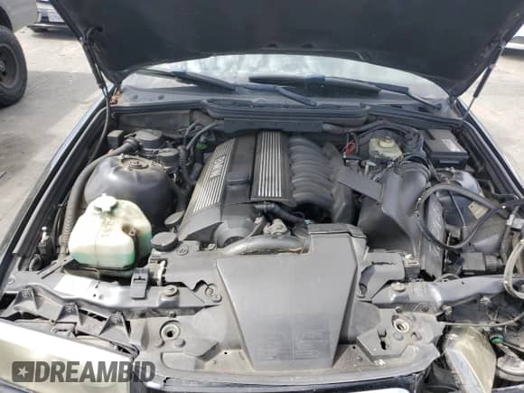 1998 BMW 3 Series z VIN WBACD3321WAV24693, wystawiony jako Copart lot #66515794 z przebiegiem 228 492 mil mil oraz Szkoda całkowita • Salvage title. Historia ofert i sprzedaży dostępna na DreamBid. Obrazek 11.