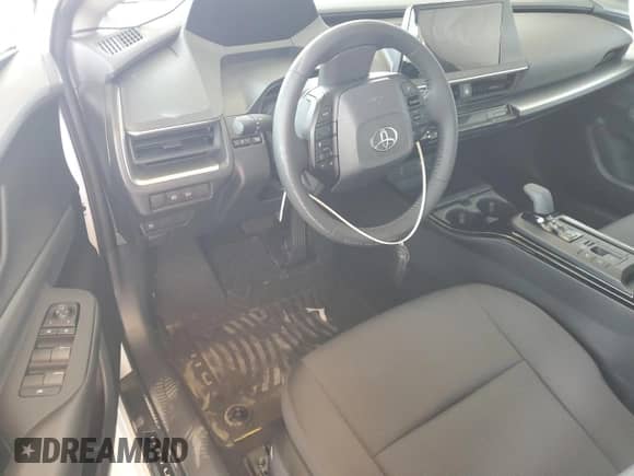 2025 Toyota Prius LE с VIN JTDACAAU5S3052468, выставлен на аукционе Copart как лот 81701345 с пробегом Не указан миль и Списание • Salvage title. История ставок и продаж доступна на DreamBid. Изображение 8.